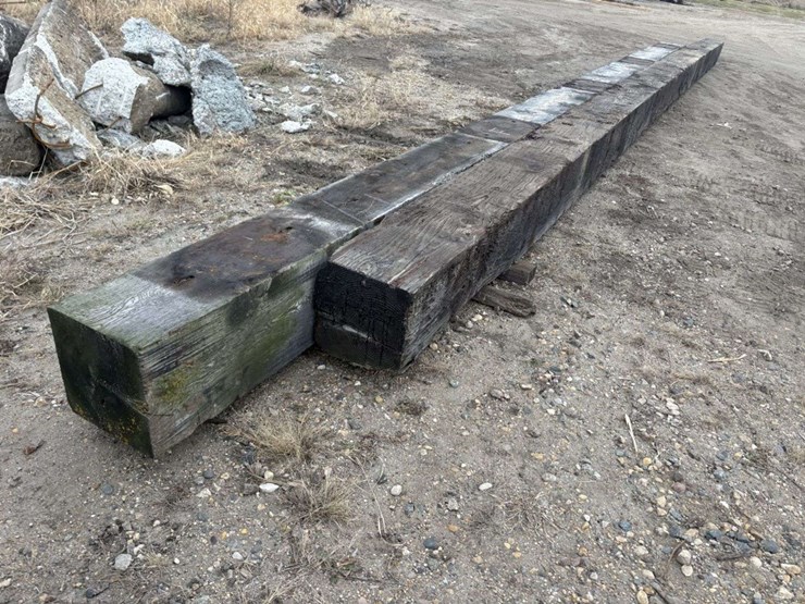 (2)-creosote-treated-wood-beams,-(1)-is-14”x14”x-38’-approx,-(1)-is-13”x14”x-32’-approx,-f-image-1