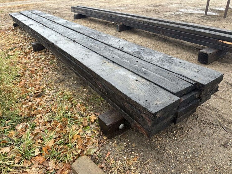 (12)-3x12”x26’-approx-creosote-treated-beams,-at-farm-image-2