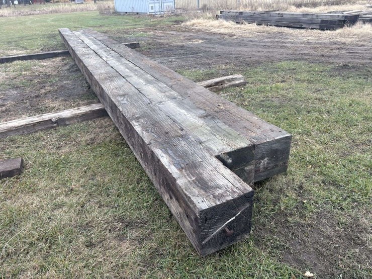 (3)-13”x13”-creosote-treated-wood-beams,-(1)-is-approx-34’,-(1)-is-approx-32.5’,-(1)-is-approx-38’,-image-1