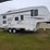 2004-prowler-fleetwood-5th-wheel-rv,-model-255-bhs,-12’-slide-out,-newer-19’-awning,-1-queen-front-b-image-1