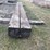 (2)-12”x12”x26’-approx-creosote-treated-wood-beams,-a-image-2
