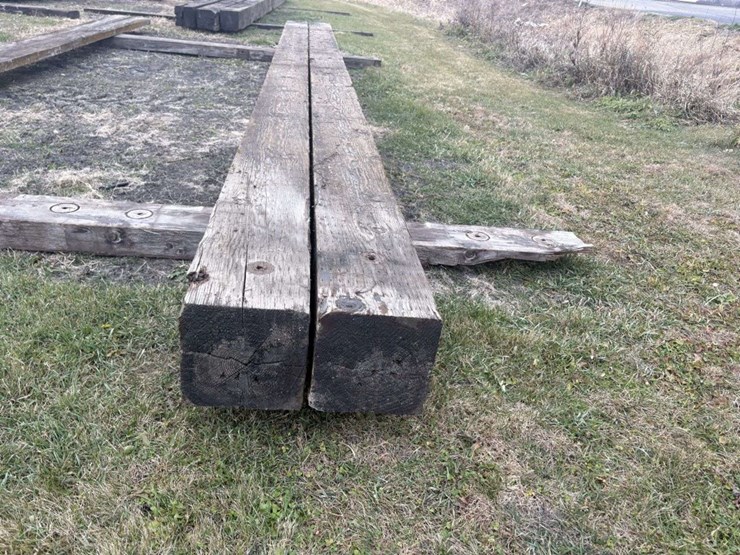 (2)-12”x12”x26’-approx-creosote-treated-wood-beams,-a-image-2