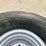 titan-16.5l-16.1sl-new-10-ply-tire-on-silver-8-bolt-ag-rim-image-3