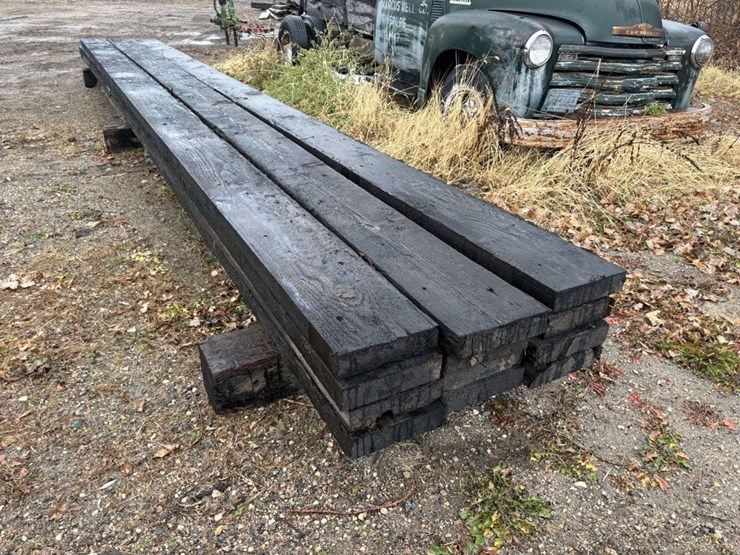 (12)-3x12”x26’-approx-creosote-treated-beams,-at-farm-image-4