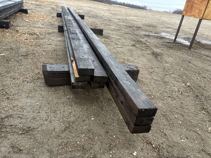 (8)-3”x6”-creosote-treated-beams,-(5)-are-approx-26’,-(3)-are-approx-28’,-at-farm-image-6