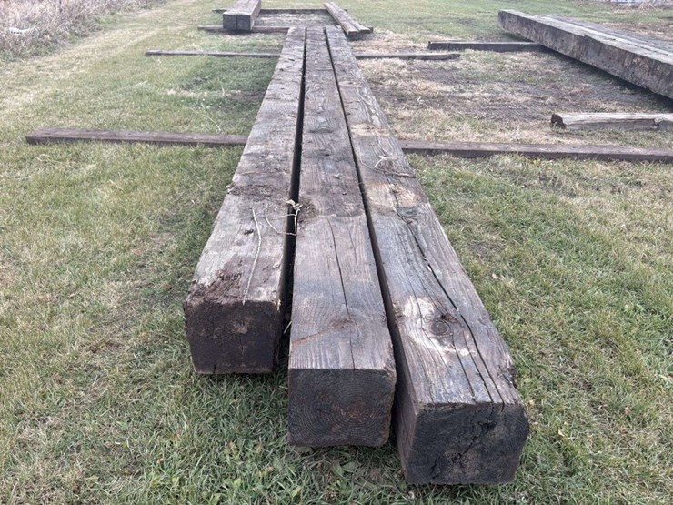 (3)-12”x12”-creosote-treated-wood-beams,-(2)-are-approx-34’,-(1)-is-approx-32’,-c-image-5