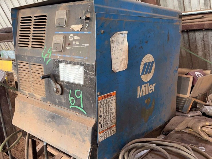miller-22a-24v-wire-feeder-&-miller-cp-302-welder-&-stand-image-1