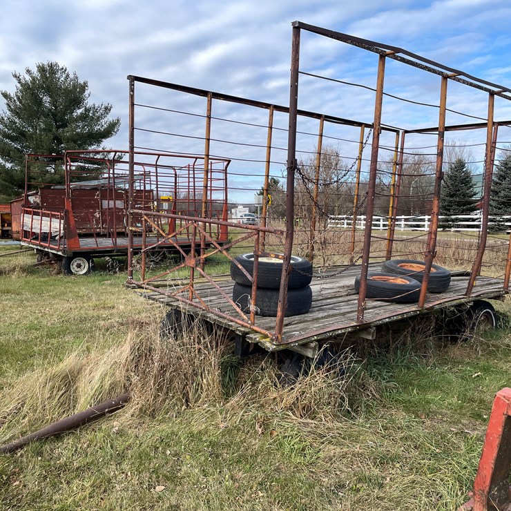 #210 • 16' Hay Rack on Running Gear (Boyceville, WI)