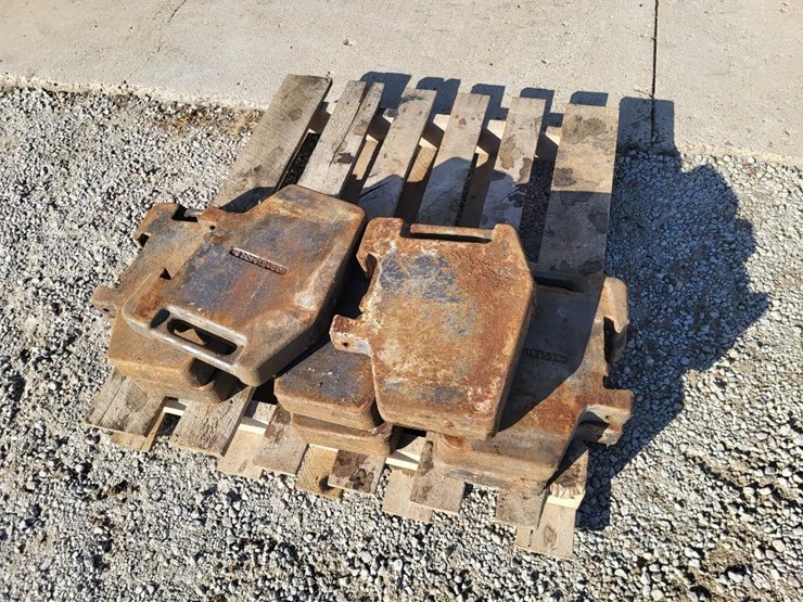 (8)-white-front-suitcase-weights-off-of-2-105-tractor-image-1