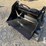 mini-skid-steer-4-in-1-bucket-image-2
