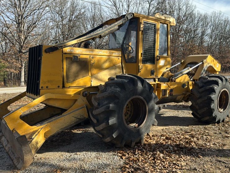 #136-•-1999-john-deere-648gll-grapple-skidder-image-1