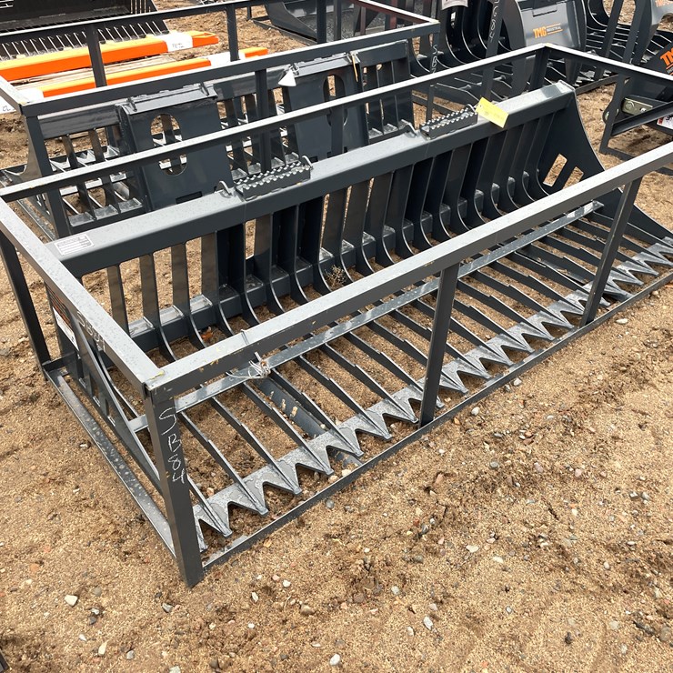 #2033 • Unused Skid Steer Rock Skeleton Bucket Attachment