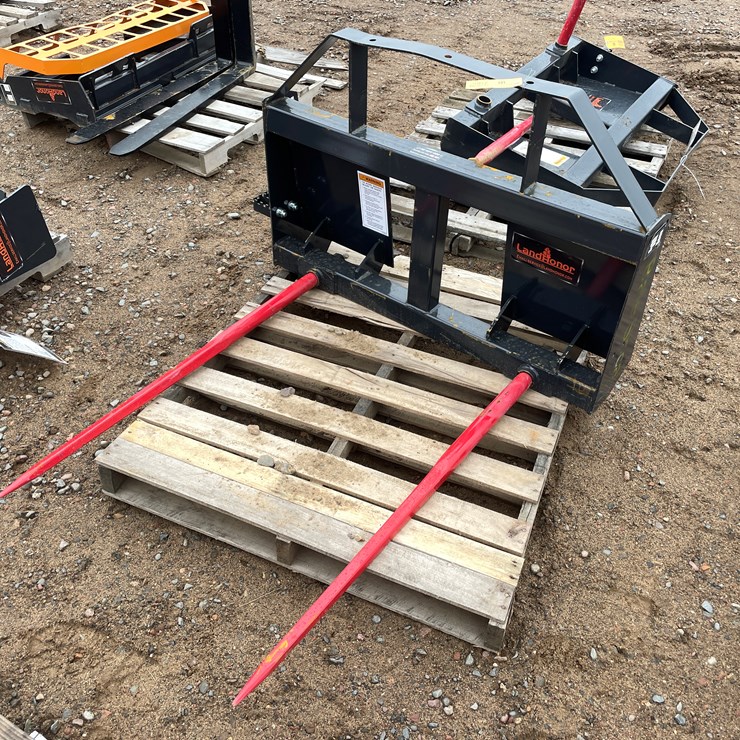 #2067 • Unused 2025 Landhonor Skid Steer Bale Spear Attachment