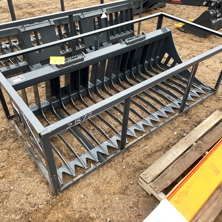 #2034 • Unused Skid Steer Rock Skeleton Bucket Attachment