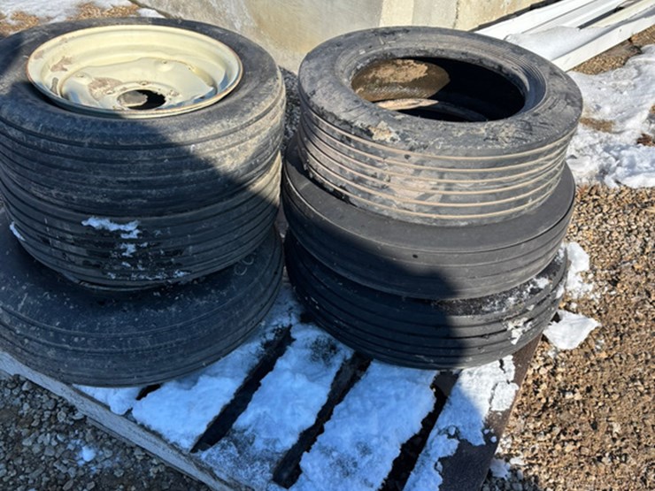 (7)-implement-tires-and-(6)-rims-(lt1488)-image-1