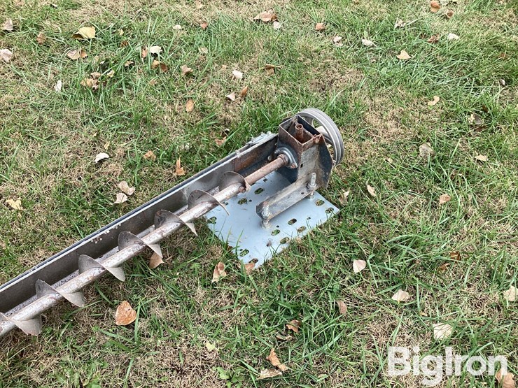 sweep-auger,-metal-saw-horses,-fan-image-20