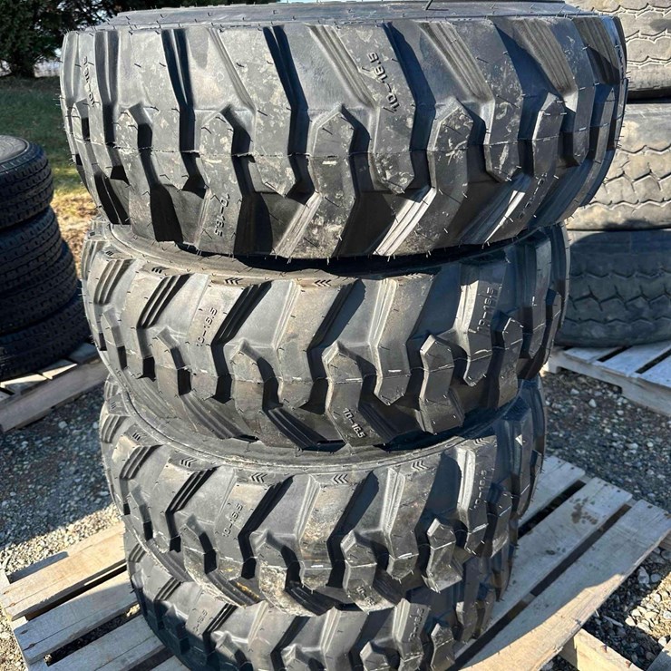 (4) UNUSED 10-16.5 Tires on Bobcat Wheels