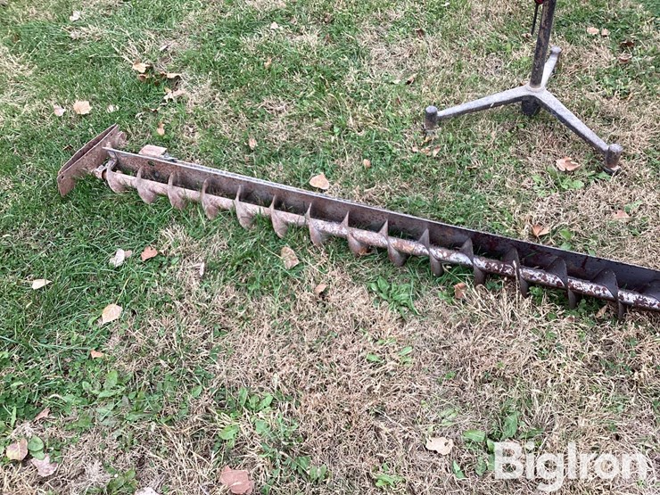 sweep-auger,-metal-saw-horses,-fan-image-17