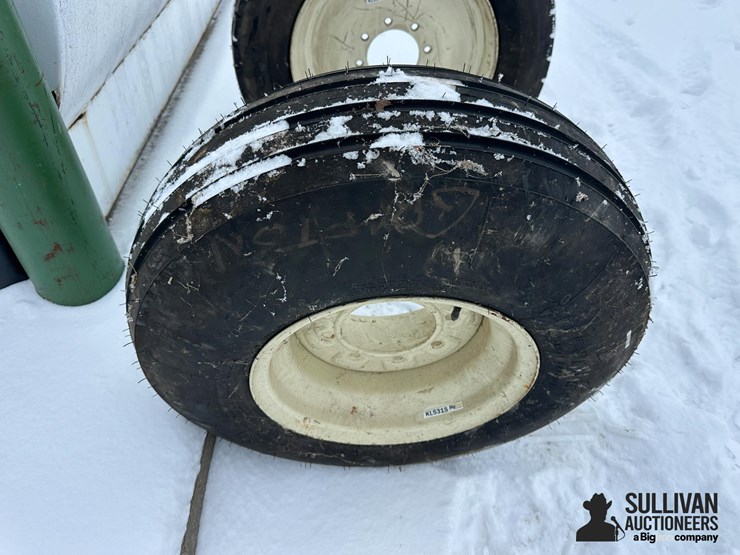 firestone-11l-15-tire-on-rim-image-1