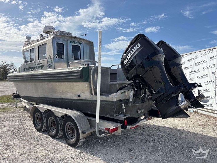 tug-boat-with-tri-axle-magic-tilt-boat-trailer-image-4