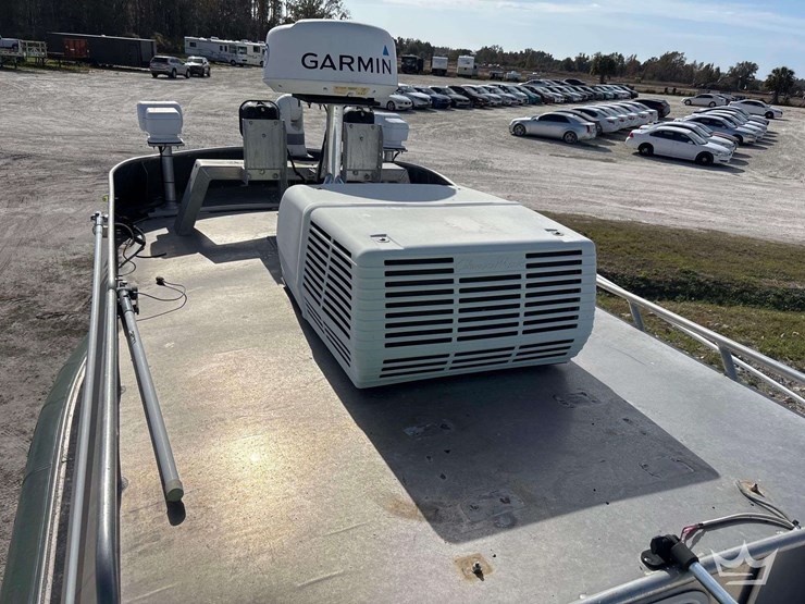 tug-boat-with-tri-axle-magic-tilt-boat-trailer-image-55