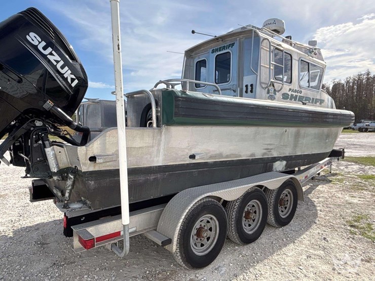 tug-boat-with-tri-axle-magic-tilt-boat-trailer-image-3