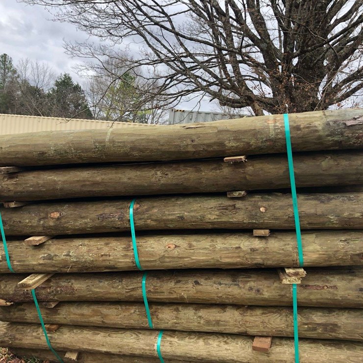 BUNDLE OF (24) 7"X8' PRESSURE TREATED POSTS