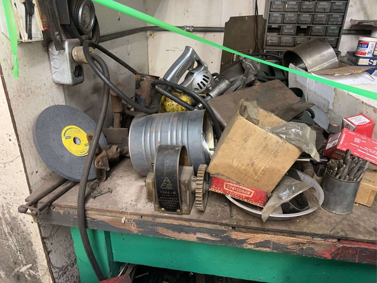 work-bench-with-parts-and-tools-image-8