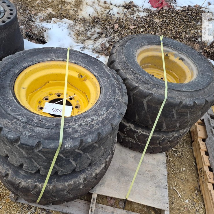 SKID LOADER TIRES AND RIMS