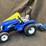 ertl-new-holland-tc33da-tractor-and-plow-image-1