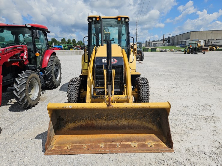 #203035-•-2021-caterpillar-416st-backhoe-image-2
