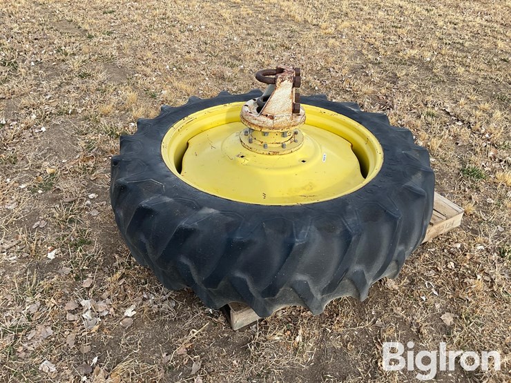 firestone-15.5-38-tire-&-john-deere-rim-image-1