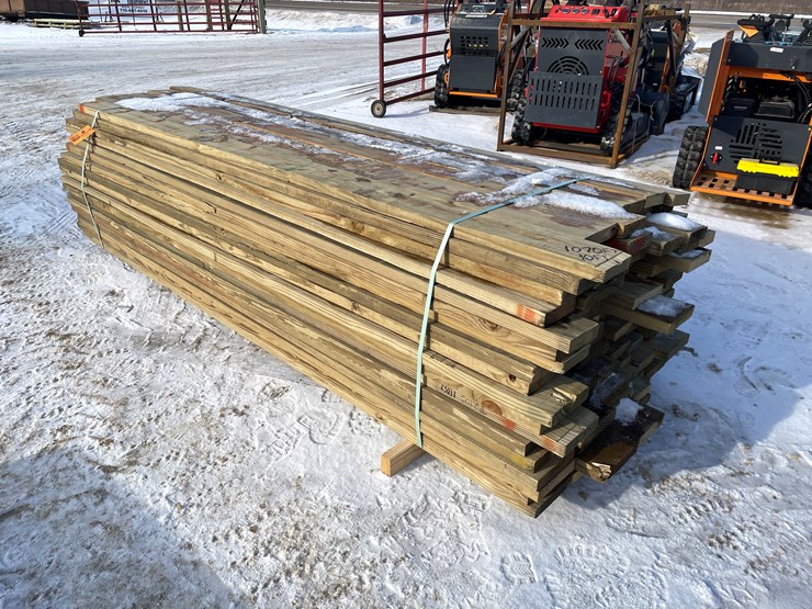 #3812-•-bundle-of-green-treated-lumber-image-1