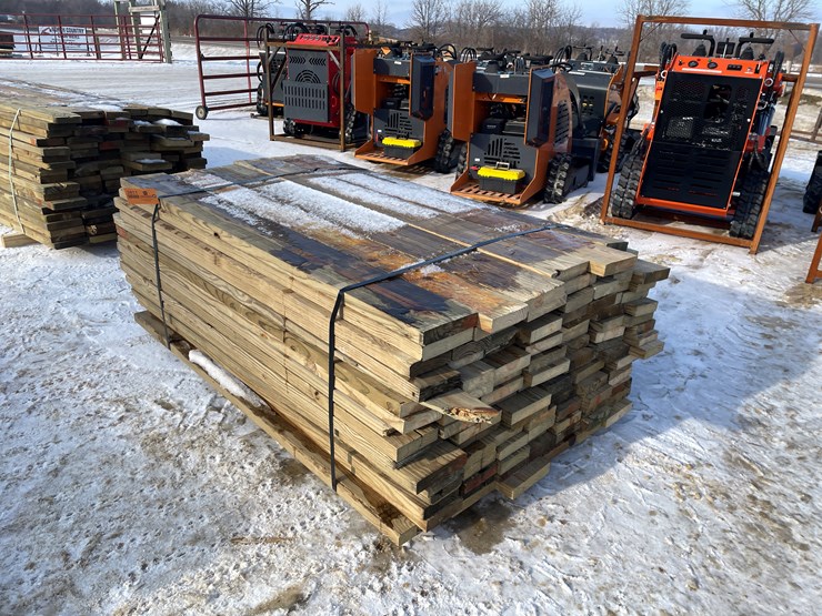 #3811-•-bundle-of-green-treated-lumber-image-1