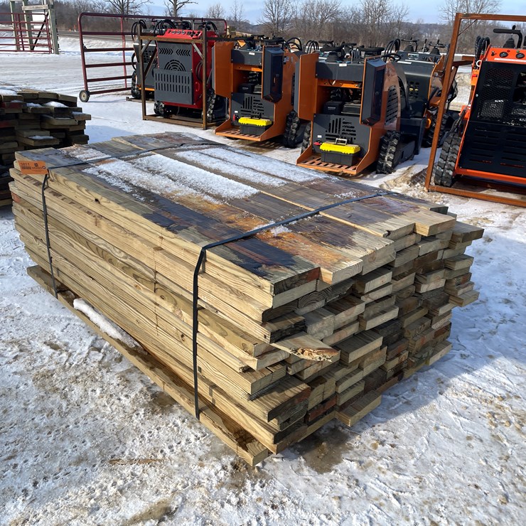 #3811 • Bundle of Green Treated Lumber