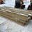 #3780-•-bundle-of-treated-lumber-image-1