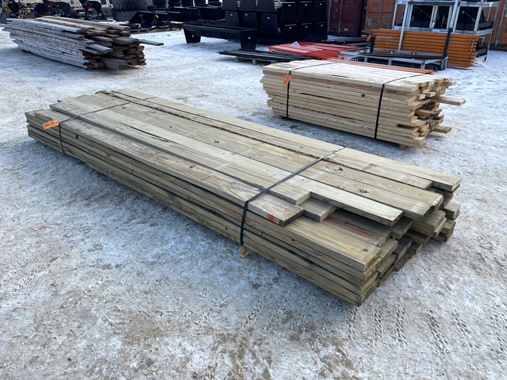 #3804-•-bundle-of-green-treated-lumber-image-1