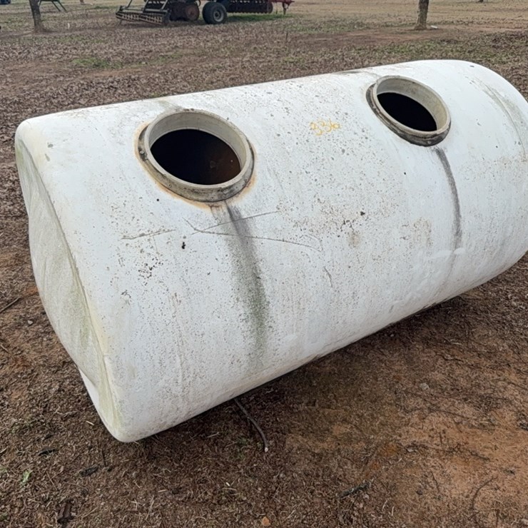 dual compartment, fiberglass tank appears to be intact