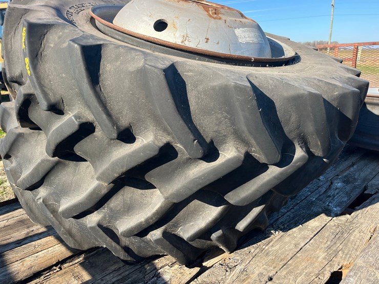 4-tractor-rims,-10-hole-steel,-two-with-85r-42-r1-tires,-for-more-information-call-252-924-0020-image-1