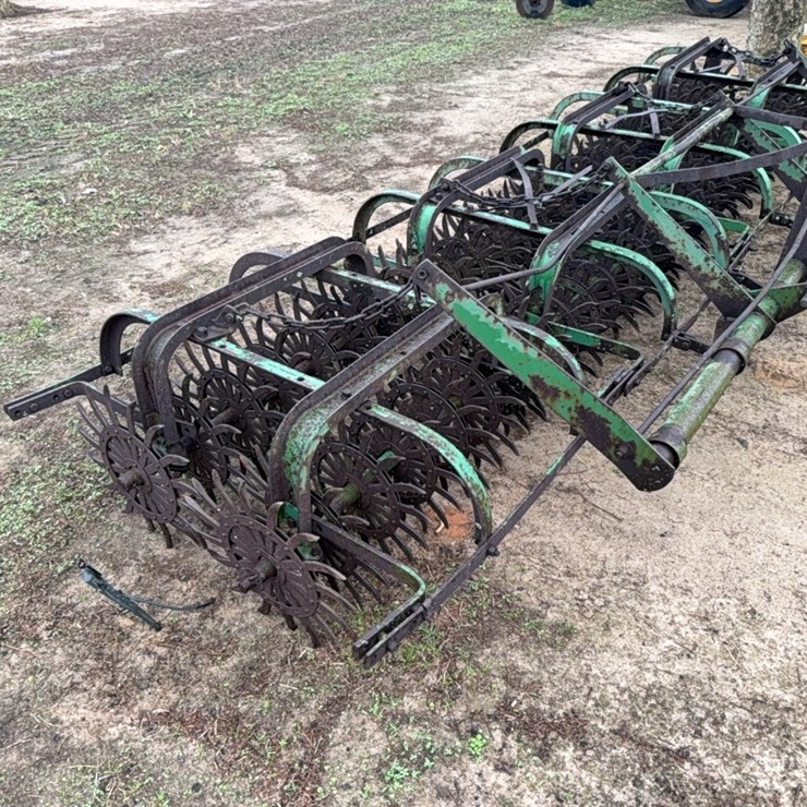 John Deere 3pt. 4 section rolling pecker hoe approximately 12 ft.