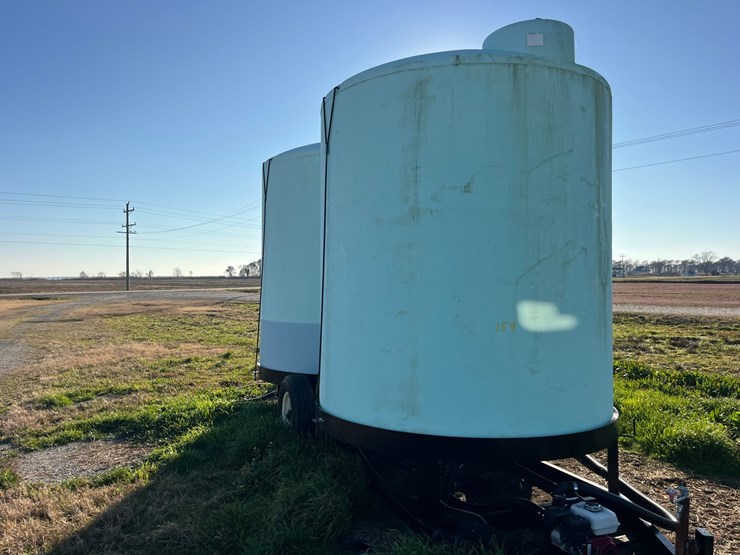 popup-portable-storage-tanks,-2-3000-gal-poly-tanks,-honda-gx160-motor-&pump,-2”-hoses-&-fittings,-almost-new-unit,-call-252-943-4231-for-more-information-image-2