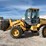 2004-deere-324h-image-32