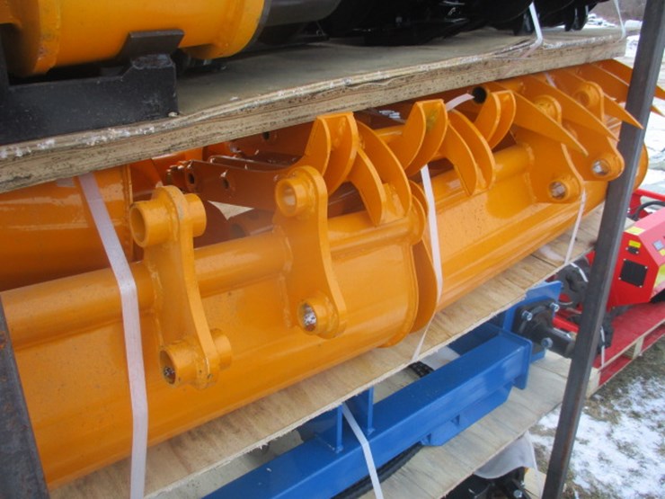 #6639-•-cat-301-excavator-attachment-package-qty-(8)-rake,-ripper,grapple,12inch-auger,-16-inch-auger,8inch-narrow-bucket;-24inch-bucket,32inch-bucket-fits-cat301-image-1