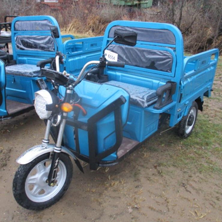 #6554 • IRET13 ELECTRIC TRICYCLE IRET13 ELECTRIC TRICYCLE Vehicle size: 2700*970*1325mm Carriage size:1300*900mm Motor: 800W Controller: 12 tubes Tires: front 300-12, rear 350-12 Hubs: front 300-12, rear 350-12 Instrument: large screen LCD digital instrum