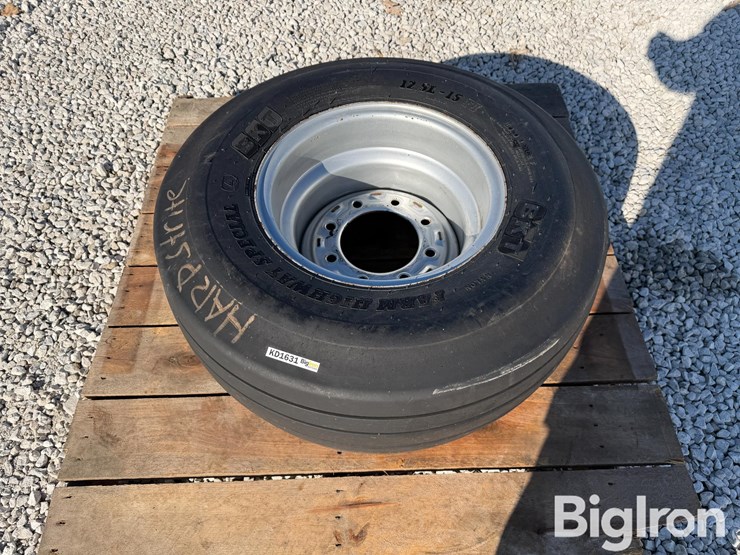 bkt-12.5l-15fi-load-range-f-tire-&-silver-8-bolt-rim-image-2