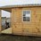 #6149-•-12x8-cabin-12x8-cabin-with-porch-windows-man-door-image-2