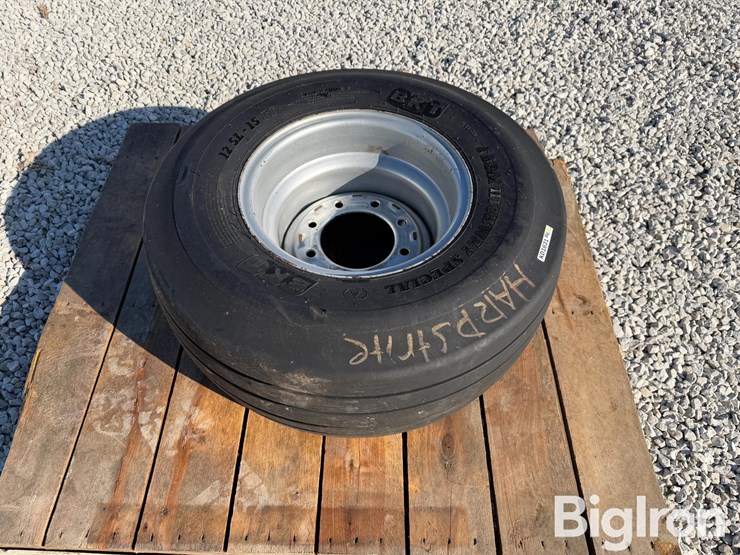 bkt-12.5l-15fi-load-range-f-tire-&-silver-8-bolt-rim-image-4