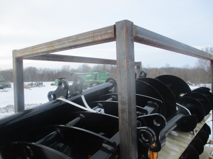 #6638-•-mini-excavator-attachment-package-qty-(8)-rake,-ripper,-grapple,12inch-auger,-16-inch-auger,8inch-narrow-bucket;-24inch-bucket,-32inch-bucket-image-1