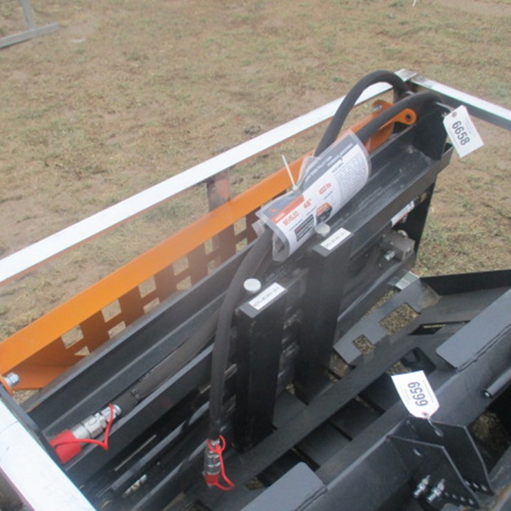 #6658 • 48" Pallet Fork Hydraulic Adjustable Unused 2025 48" Pallet Fork Hydraulic Adjustable Fork Rating:4,000 lbs Mounting:Universal Skid Steer Forks:48 in Long Adjustable With Locks Side Steps:2 Headache Rack:Beveled Fork Tines LxWxH:48" x 4" x 1 1