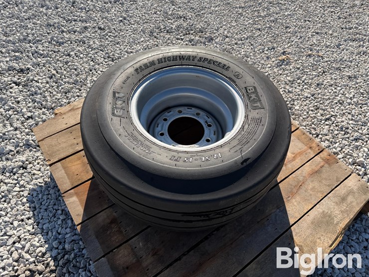 bkt-12.5l-15fi-load-range-f-tire-&-silver-8-bolt-rim-image-7